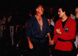 Superfoot Bill Wallace demonstrating with Dan Bernard, a friend of Sifu West